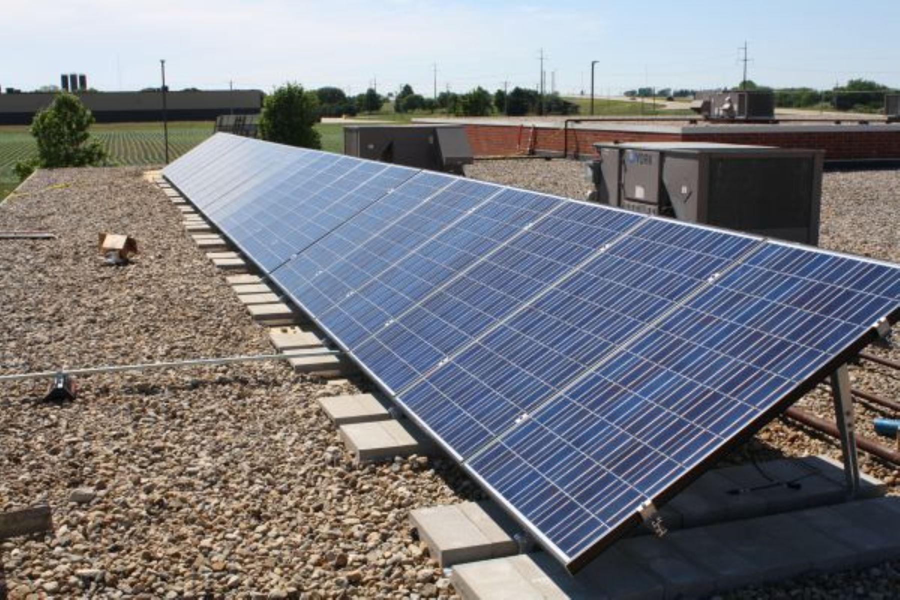 How to Integrate Solar Panels into Your Commercial Roofing System